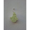 Adorno muñeco de nieve de cemento fosforescente con sombrero de copa colgado de forma vertical en pared exterior.