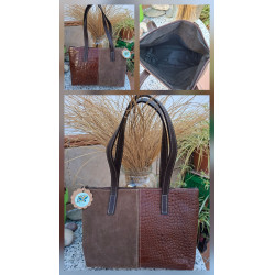 Interior textil marrón con bolsillos internos abiertos y compartimento con cierre para bolso shopper artesanal.