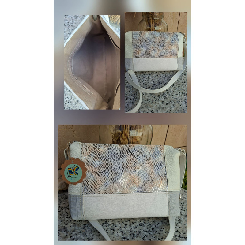 Bolso artesanal de piel Lisviv con diseño de bloques en color blanco, gris y centro grabado de serpiente multicolor.